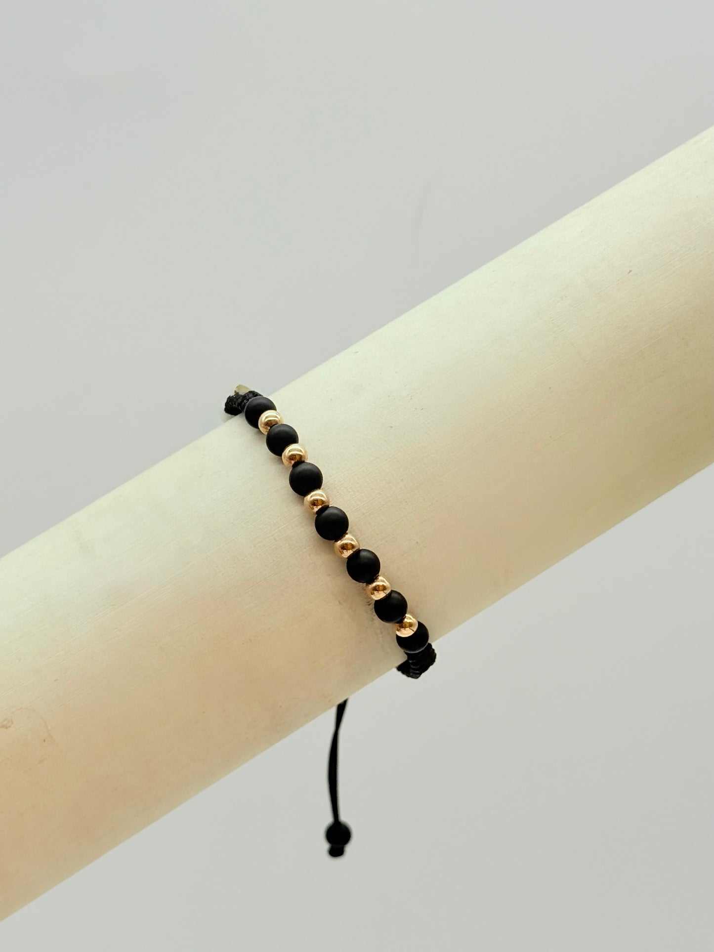 Black Matte Beads With 6 Gold Beads Bracelet In 18K