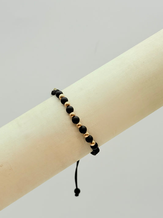 Black Matte Beads With 6 Gold Beads Bracelet In 18K