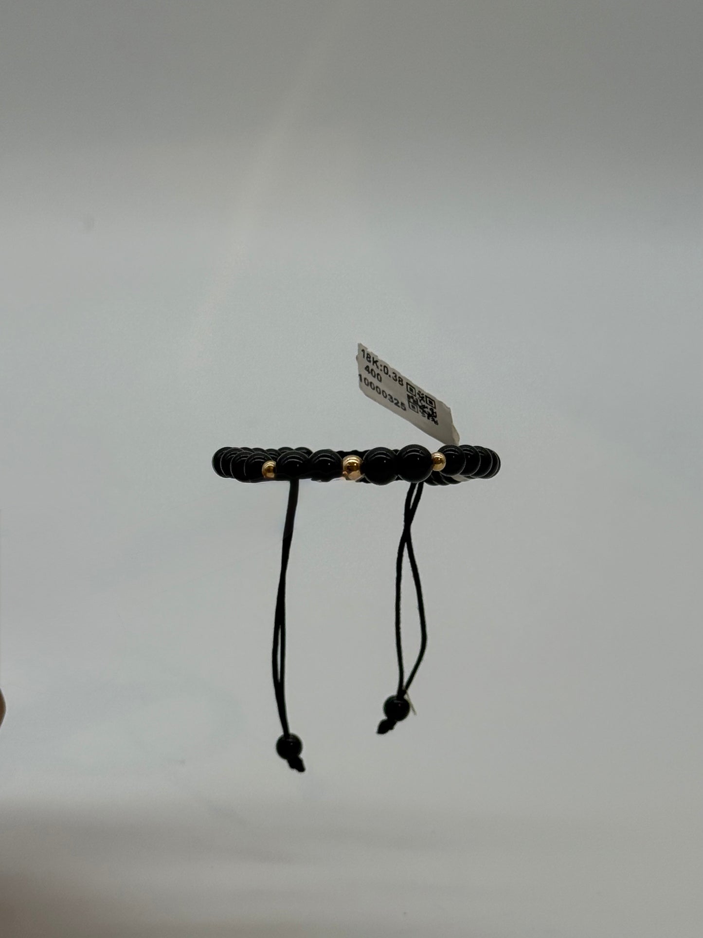 Glossy black beads and gold beads in Bracelet 18K