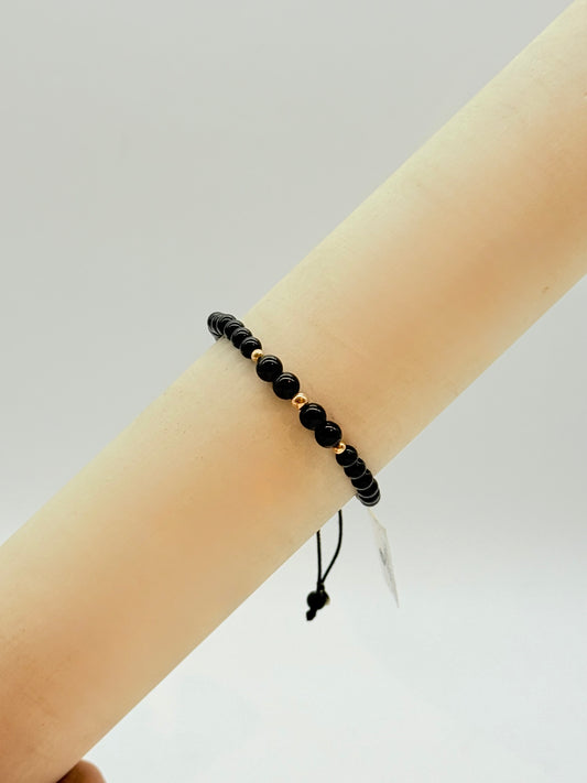 Black Beads With Gold Beads in Bracelet 18K Gold