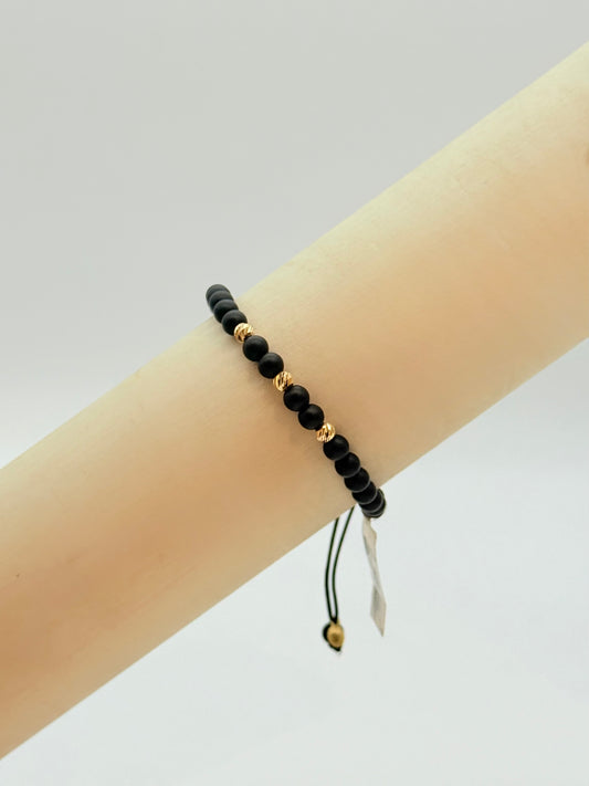 Black Matte Beads With Etched Gold Beads Bracelet In 18K